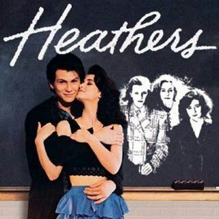 CHRISTIAN SLATER AND WINONA RYDER in a movie poster for Heathers. | Photo from aminoapp.com.