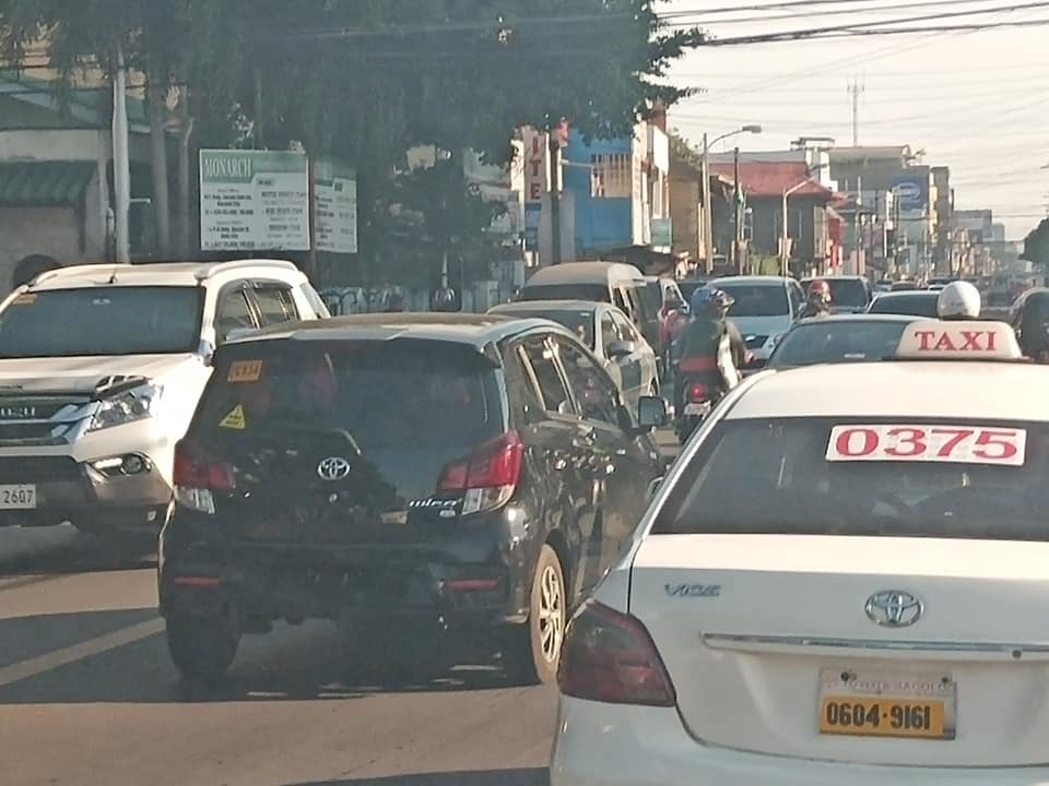 Private vehicles create traffic along Lacson-Burgos Streets. Since the untat-biyahe covers only public transport, privately-owned cars and taxi cabs continue plying the city streets, so certain thoroughfares are still as busy as ever. | Photo by Hannah A. Papasin