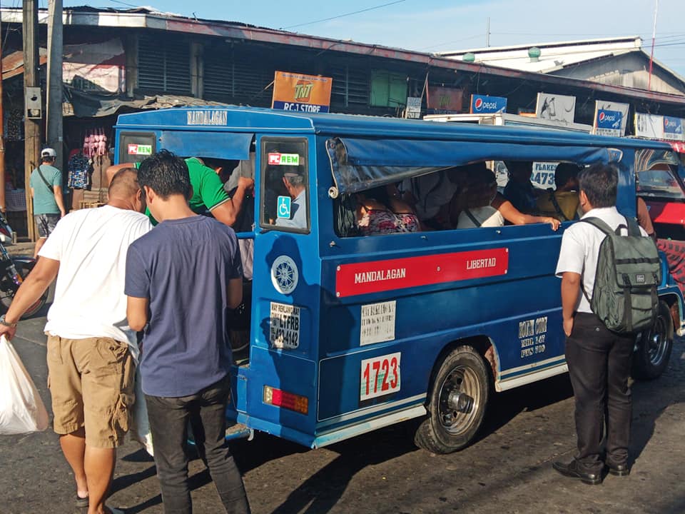 Business  as usual. Certain jeepney units did not join the strike, like this one  plying the Mandalagan-Libertad route providing transportation for  passengers. Photo by Hannah A. Papasin