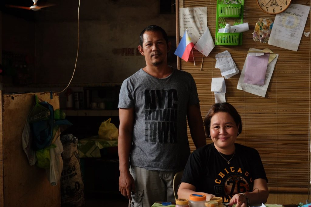 HEIR TO TITA MORITA. Noreen Mahilum's passion for brewing coffee was passed on to her by her aunt, Morita or Morit. She is shown here with her husband, Santiago at the KD's Cafe. | Photo by Lourdes Rae Antenor