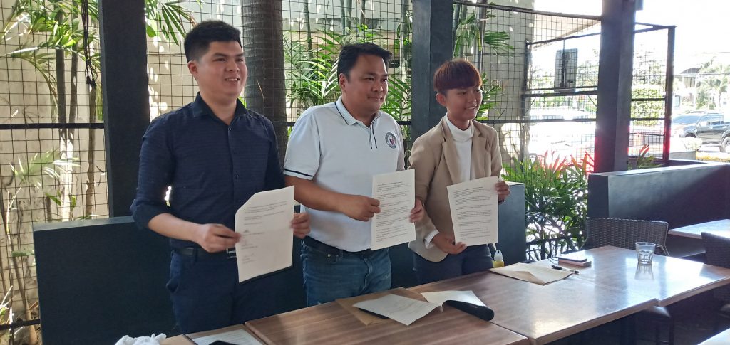 Bacolod Cong. Greg G. Gasataya (center) during the signing of a joint declaration with the local chapter of the Youth for Mental Health Coalition last year. With Gasataya are then Y4MH local head Louie Raner, left, and Charisse Erinn Flores of Akbayan Youth. | Photo courtesy of Pao Aguila