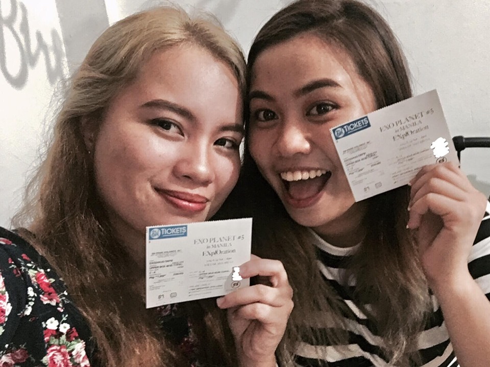 Evan and Ems showing their Exo concert Tickets. | Photo by Evan Jane Guino-o 