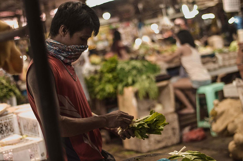 market monitor: pork prices hiked, chicken prices dropped during pandemic, survey shows 2 A vegetable vendor prepares his wares for display at the Burgos South Public Market. | Photo by Rodney A. Jarder, Jr.