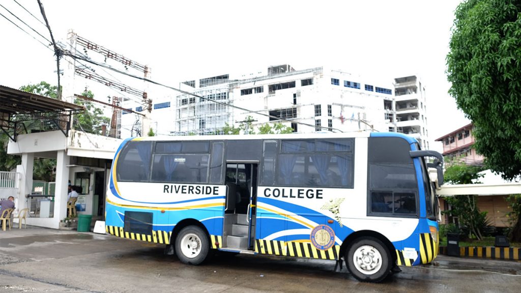 Riverside College has its own bus, sporting the iconic blue of the school.  | Photo by Rodney A. Jarder, Jr.